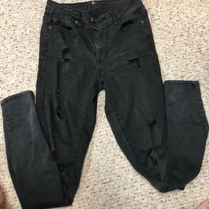 Black skinny jeans with rips